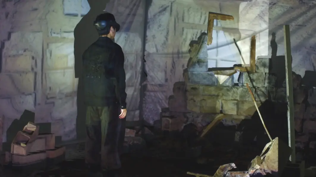 Player in a Meta Quest Pro headset standing among rubble and projected ruins in the Back to Home mixed reality game